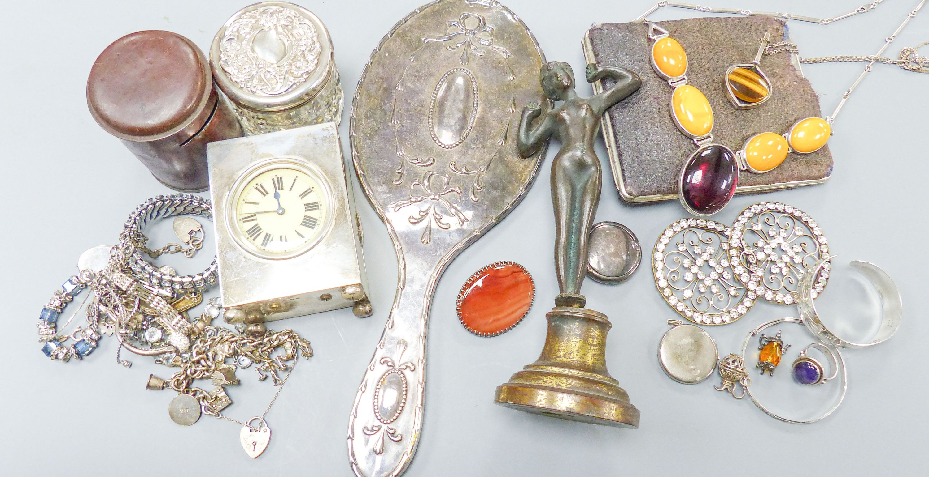 A George V silver cased carriage timepiece, London, 1926, 9cm and other assorted collectables including costume jewellery, amber necklace, etc.